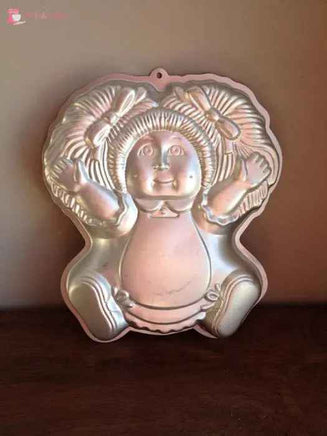 Cabbage Patch Doll Cake Tin Hire - The Cake Mixer